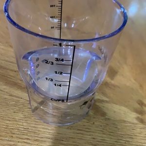 Pampered chef reversible measuring cup.
